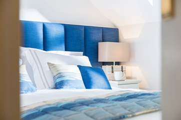 Carefully chosen fabrics and soft furnishings can be found throughout this gorgeous cottage.