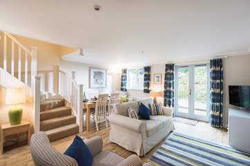 The cottage is spacious inside and has an enclosed patio garden to the rear.