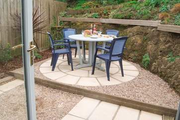 The enclosed garden has room to relax and dine. (sunny photo to follow as it is a real sun trap when the sun does come out!)