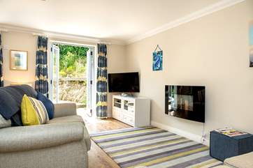French doors lead out onto the enclosed patio garden.
