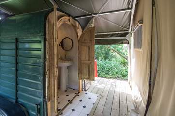 This unique shower room is behind the bedrooms.