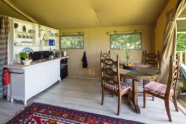 The kitchen has a gas hob, hot running water a fridge and a freezer for essential ice and holiday treats.