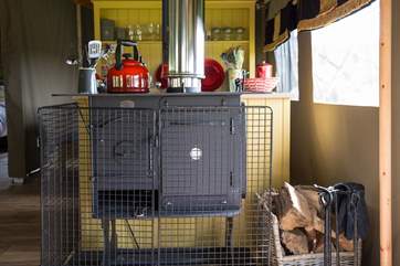 The wood-fired range is great for cooking and heating, but there is a two ring gas hob as well.