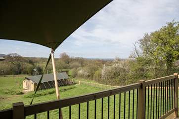 Murciano is the higher of the two luxury safari tents with fabulous views from the deck over the Blackmore Vale.