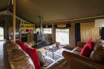 The cosy seating area, kept toasty warm on a cooler evening by the wood- fired range.