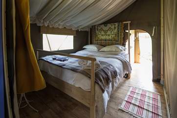 Your super comfy double bed awaits you after a day of fresh air and exploring.