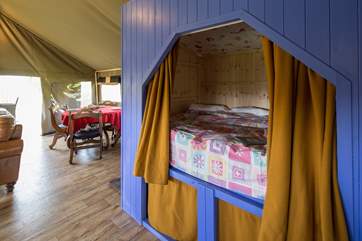 Children will love being in this cabin bed with the curtains drawn.