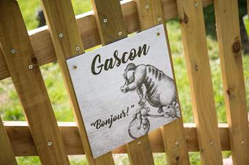 Gascon on the gate, identifies your holiday safari tent and gives a French welcome.