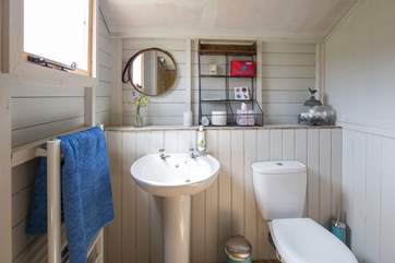 The cloakroom has a heated towel rail to keep the room snug.