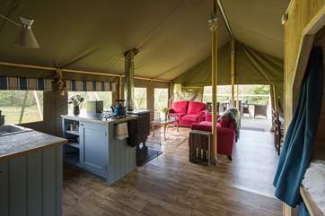 These luxury safari tents have a very spacious and sociable open plan interior.