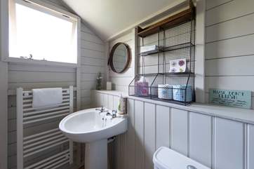 The cloakroom has a heated towel rail to keep the room snug.