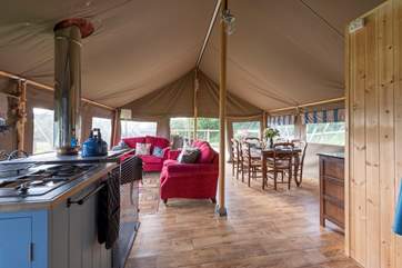 These luxury safari tents have a very spacious and sociable open plan interior.