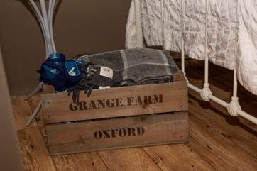The owner has thoughtfully provided hot water bottles and blankets for the chillier months.