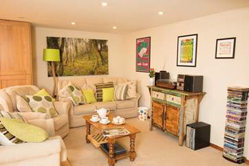 The sitting-room has comfortable seating for four people.