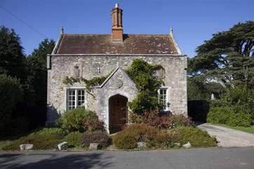 The front of the property has a grand entrance.