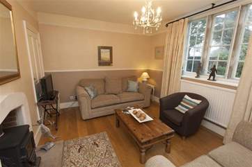 The comfortable sitting-room which overlooks the gardens.