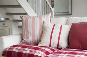 The sofa in the living room.