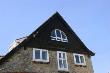 The wide picture window from outside.
