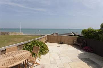 The spacious patio offers stunning views across The Solent.
