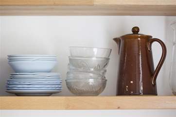 The bright modern kitchen is well-equipped.