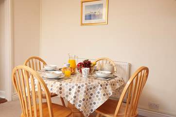 The dining area is perfectly situated just steps from the kitchen.
