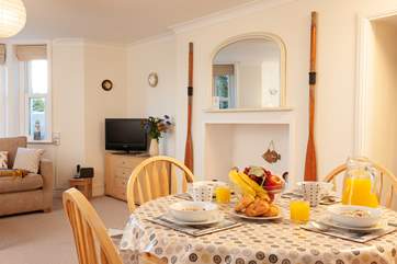 The sitting room also has a dining area, perfect for informal family meals.