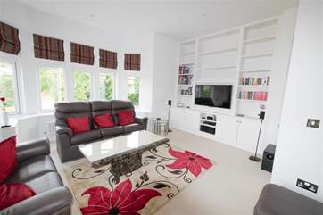 The bright and airy sitting-room.