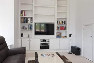 The Bose home cinema surround sound system
can be found in the sitting-room, along with a Blu-ray DVD player.