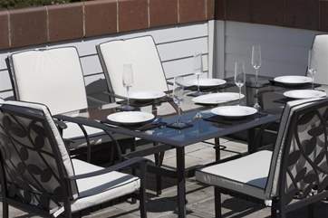 Table and chairs for roof top dining.