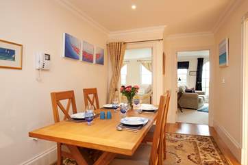 Adjacent to the kitchen, the dining area is pefect for evening meals or for planning your day out.