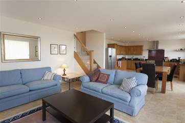 A lovely large and airy open space for living and dining with a view.