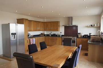 Modern kitchen and dining area.