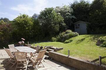 Pretty enclosed and sheltered garden, ideal for al-fresco dining.