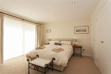 The second of the spacious double bedrooms benefits from lovely views over the garden.