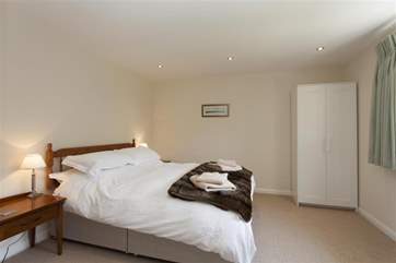The spacious double bedroom, also with en suite.
