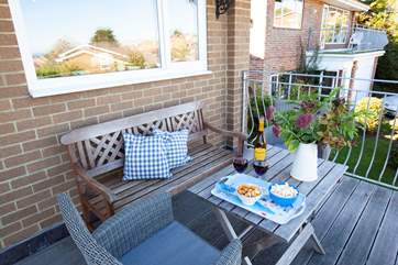 The large balcony just beyond the kitchen will be a popular spot from sun up to sun down.