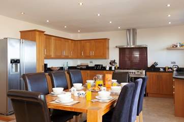 The open plan kitchen/living space sits at the heart of this home-from-home.