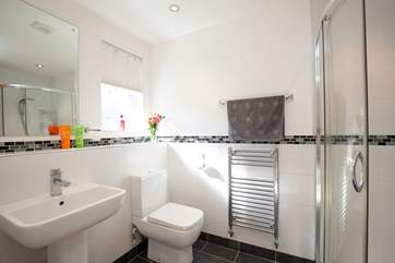 One of three modern en suite bathrooms.