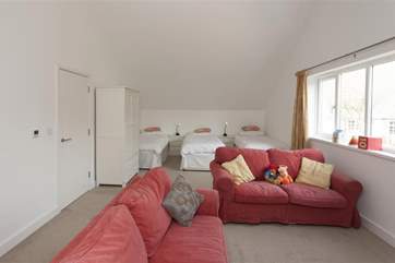 Large triple bedroom, with additioanl living area, is a comfortable place for the little (or not so little) ones to relax.