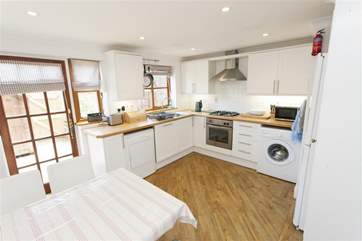 Enjoy a glass of wine whilst cooking and socialising with guests.