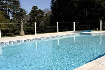 The communal heated swimming pool which is available from May to September.