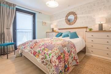 The sumptuous master bedroom has its very own balcony