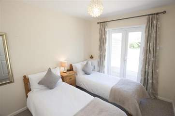 The ground floor has a twin room off the main living area.