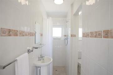 The shower room and separate WC are on the ground floor.