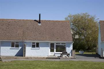 The small complex has private access and a small 'village' green.