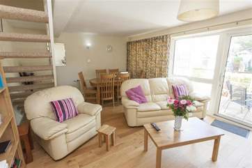 Access to the second floor is from the living/dining room
