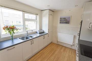 The modern kitchen was fitted only recently and has everything you should need
