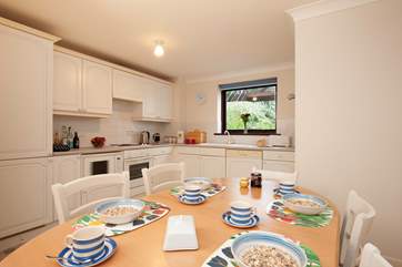 It's a good sized kitchen that will accomodate the whole family.