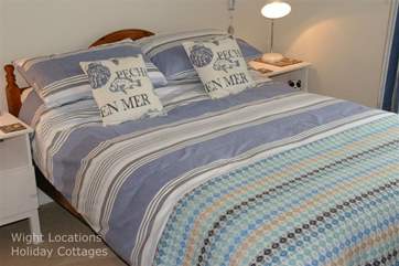 The nautical theme is reflected in the double bedroom.