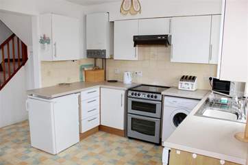 Kitchen at the rear of the house with door to garden